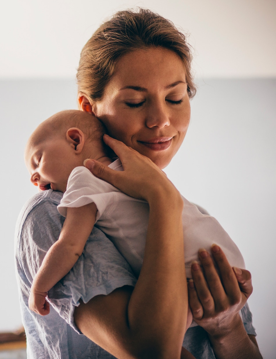mother snuggle baby